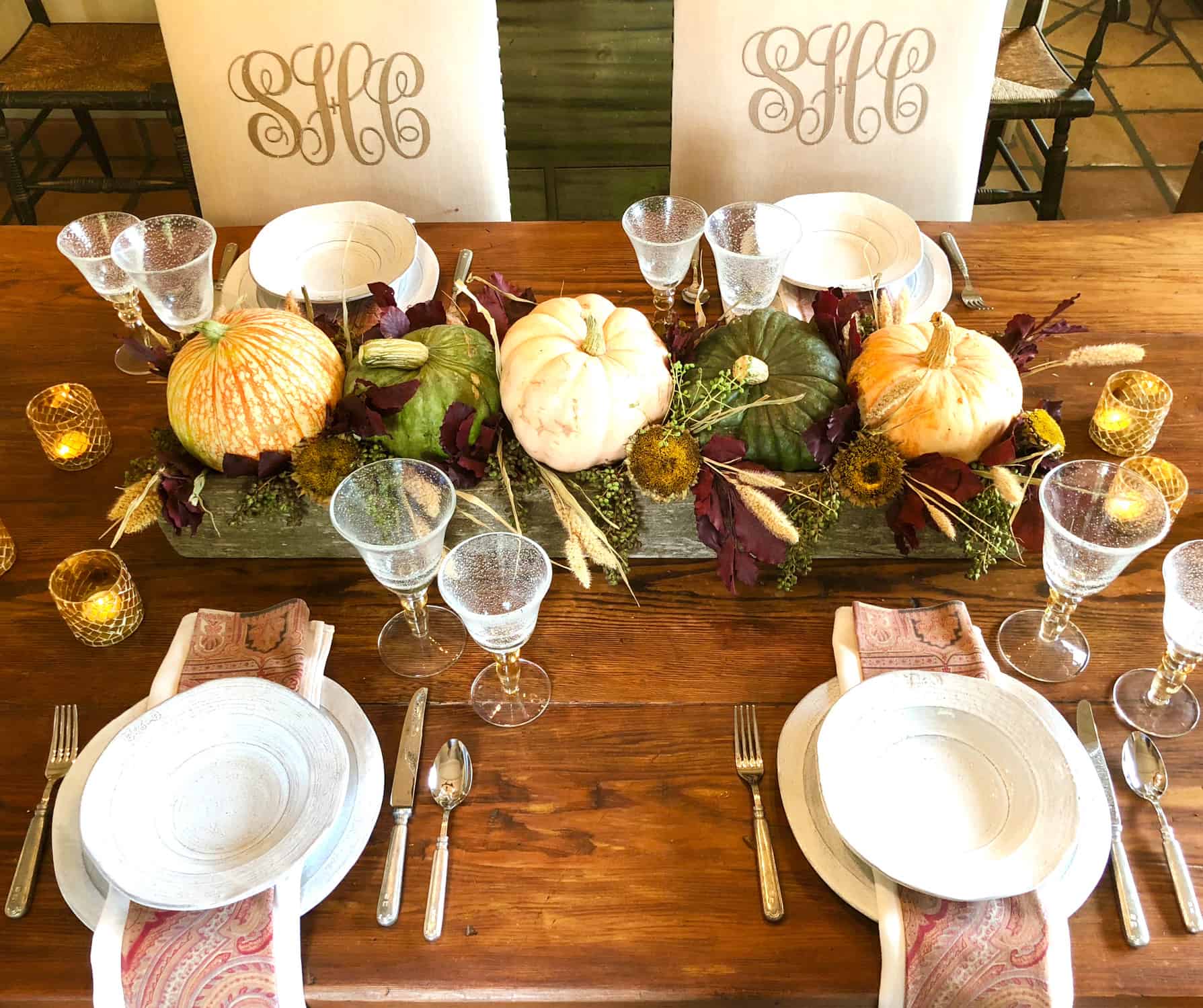 fall table with pumpkins in reclaimed wood box