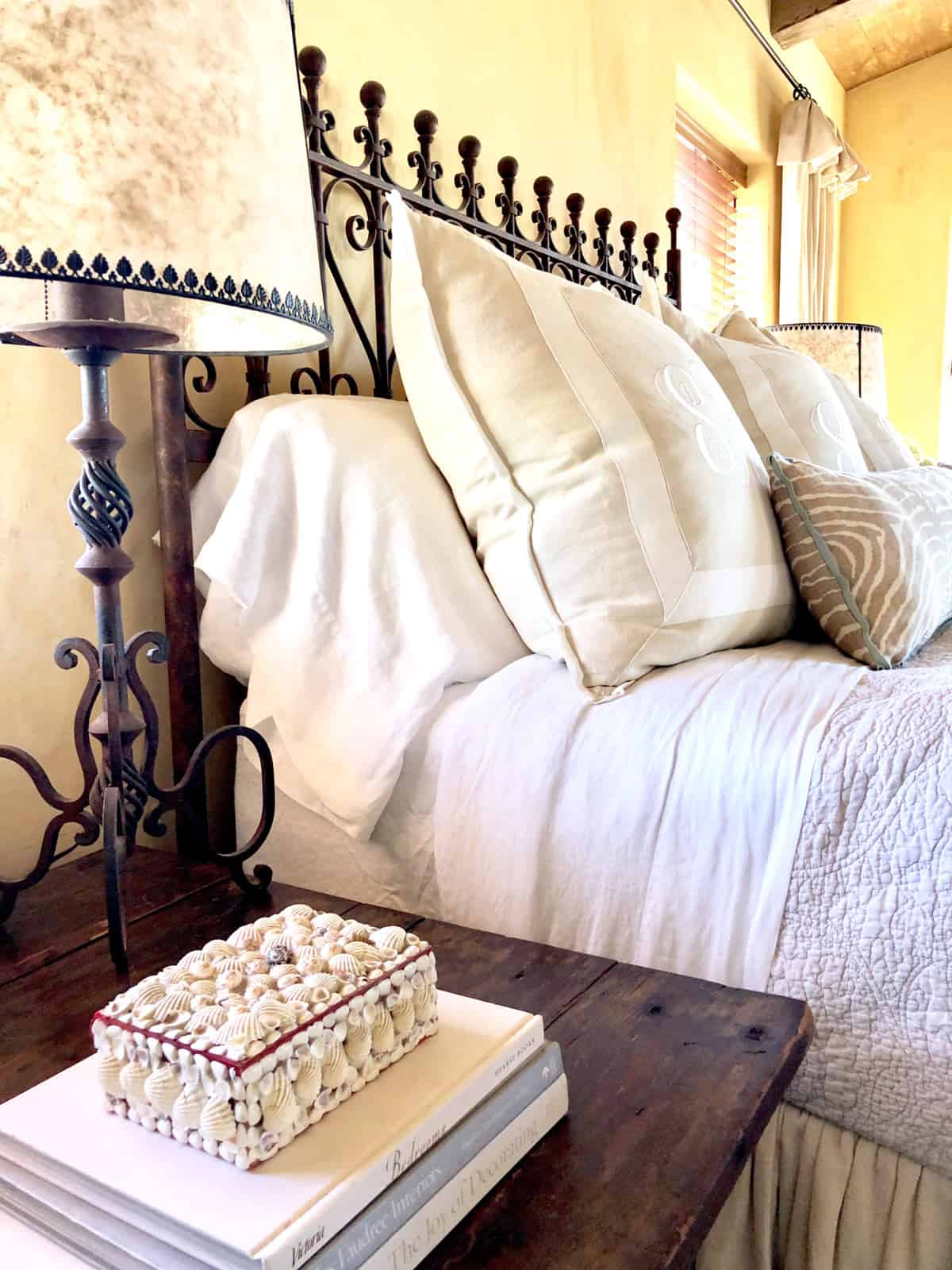 bed with natural linen sheets