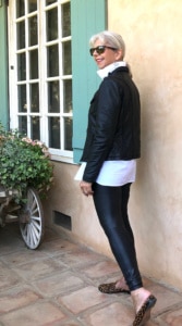cindy hattersley in black moto jacket, chicos shirt, and spanx leggings