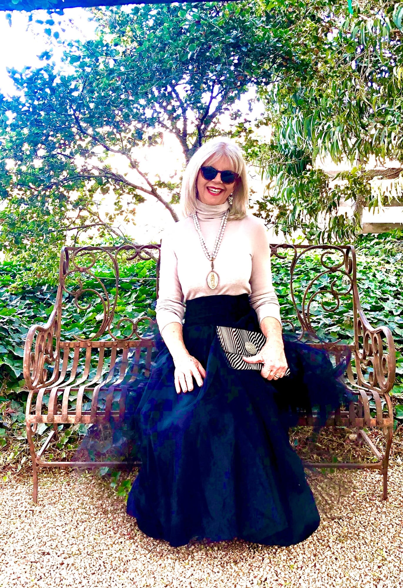 cindy hattersley wearing gray sweater and tulle skirt