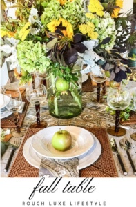 fall tablescape with sunflowers and fruit