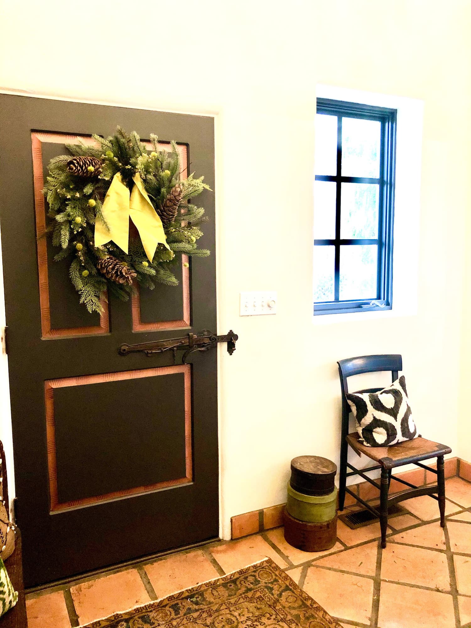 wreath on door with chair