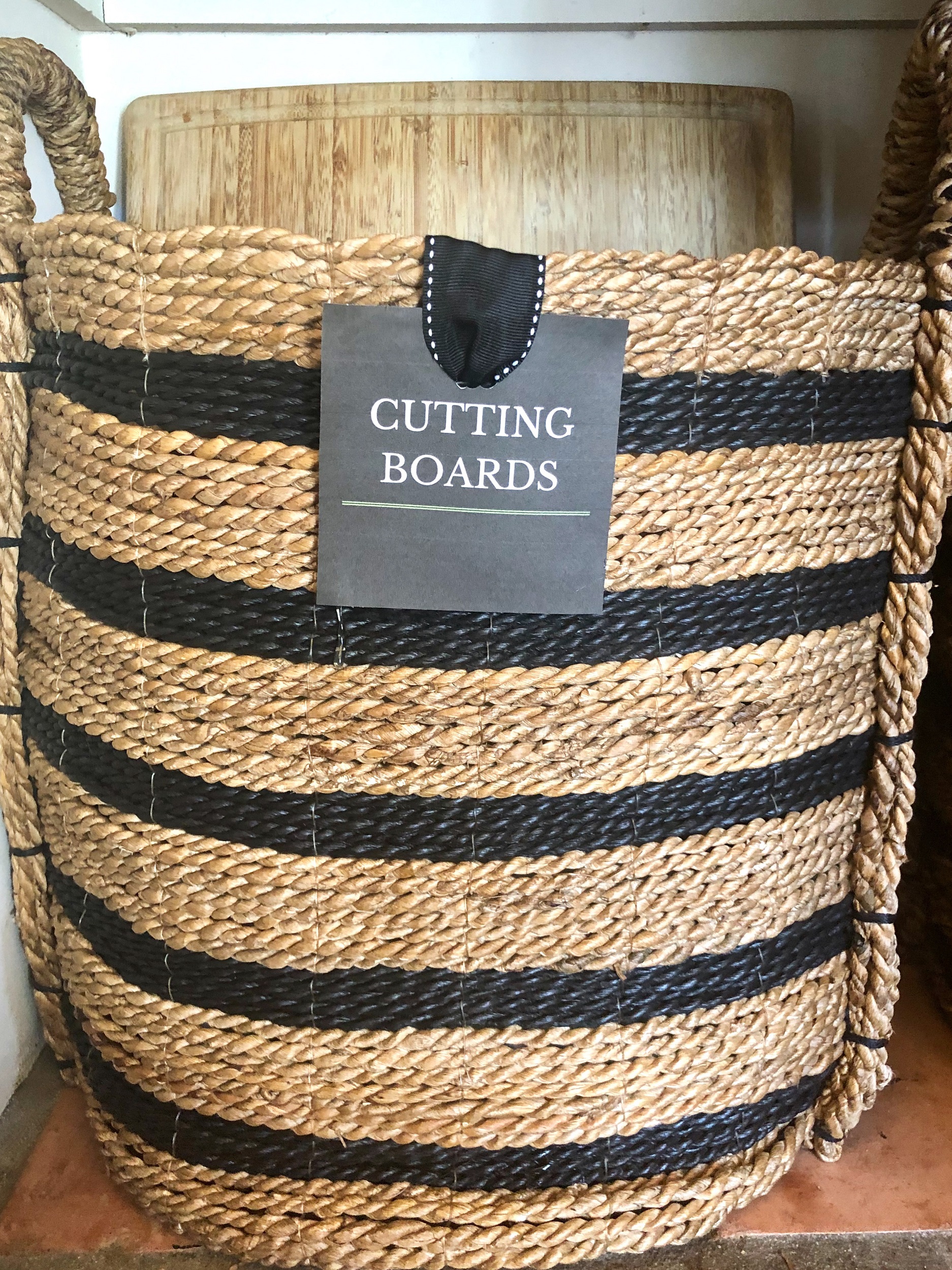 basket with cutting boards