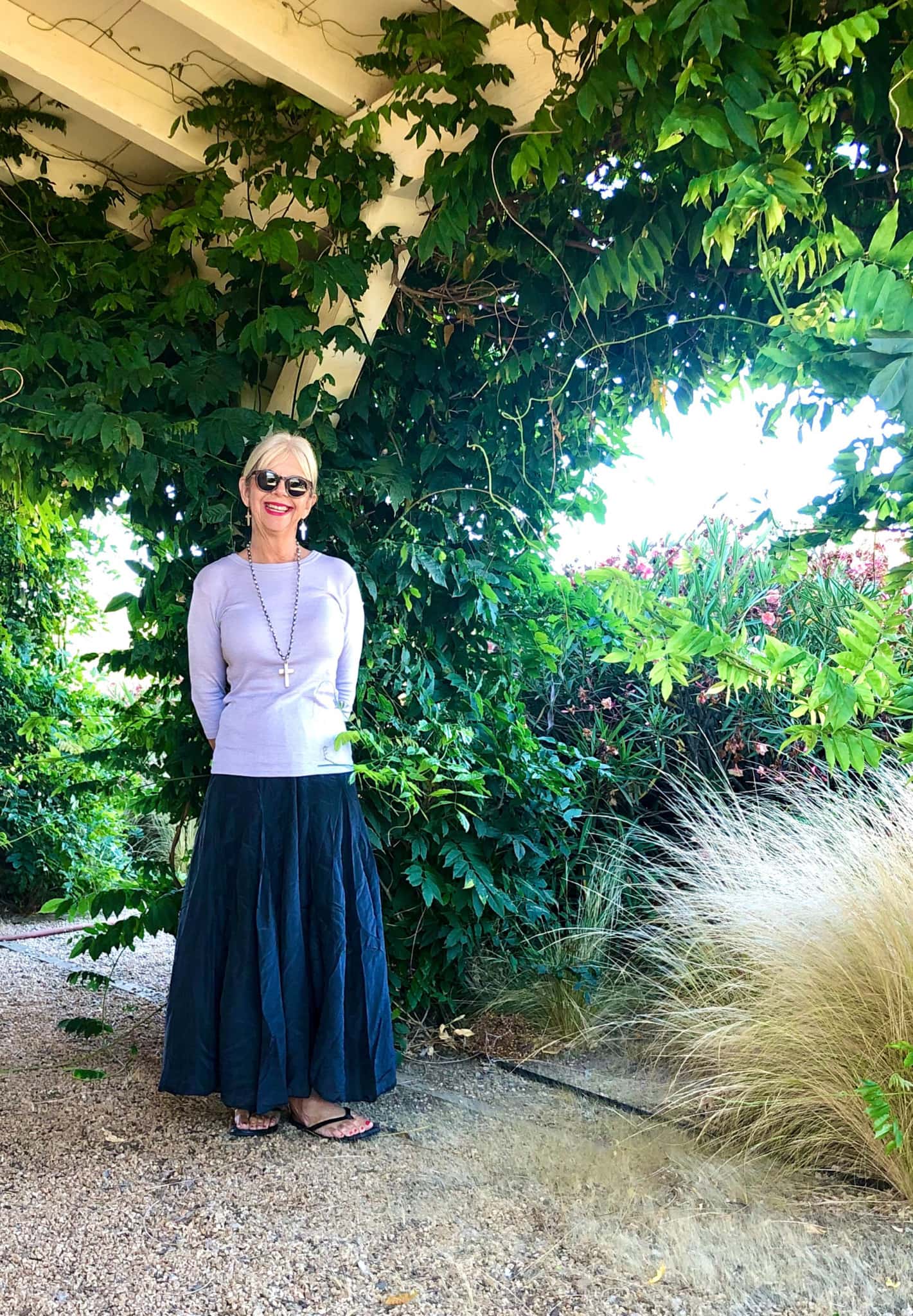 over 50 fashion blogger cindy hattersley in cp shades and michael stars in front of her barn in michael stars and cp shades