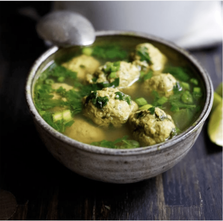 feasting at home meatball soup with turmeric, spinach and lime
