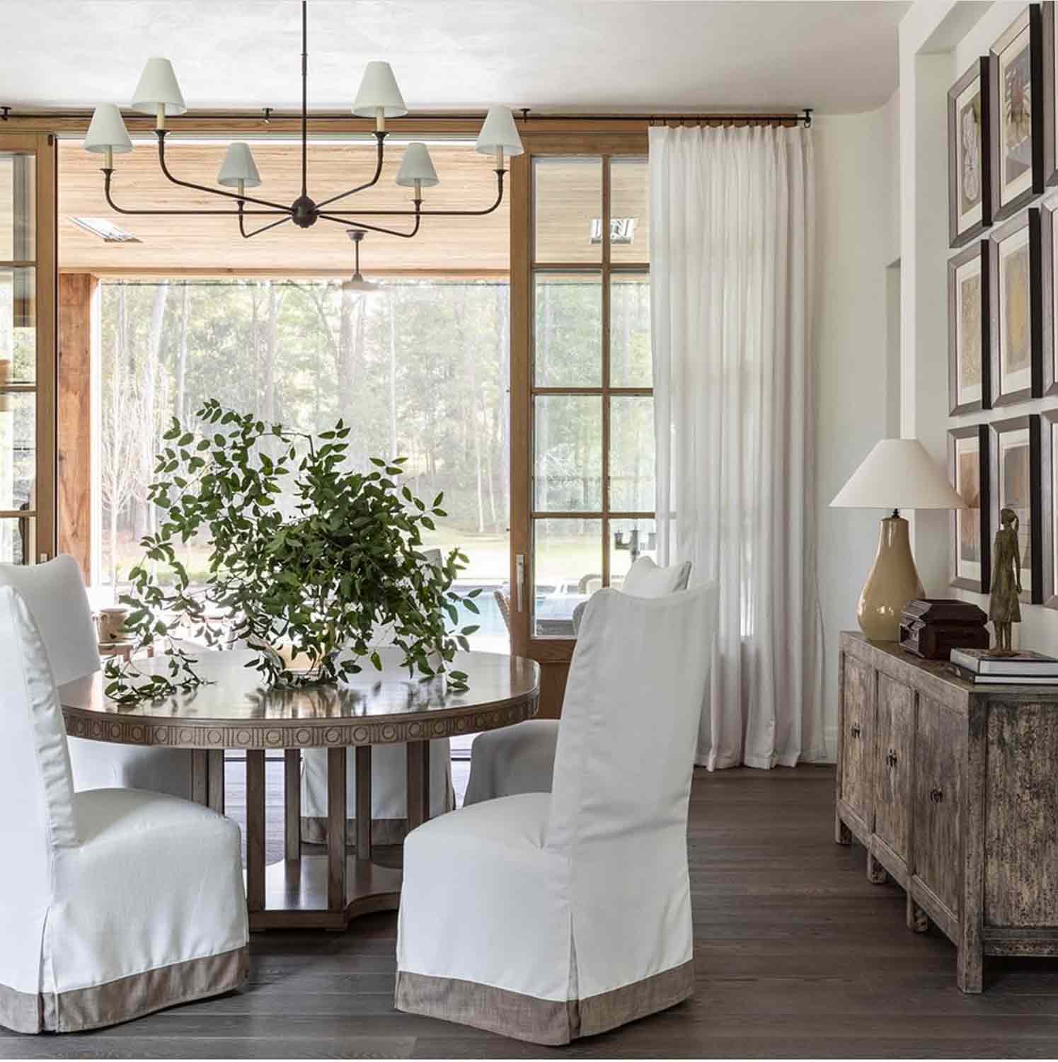 beth webb designed dining space with round table and four chairs