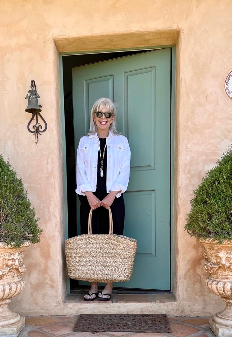 cindy hattersley in black t shirt dress and white jean jacket