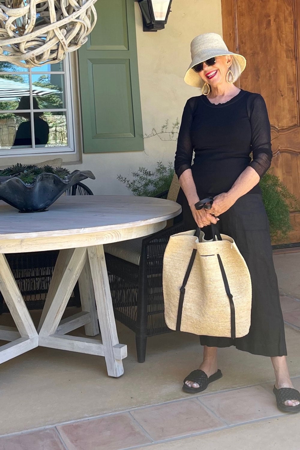 janessa leone buket hat & bag all black outfit