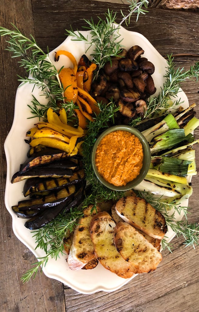 grilled vegetables with romesco sauce on platter