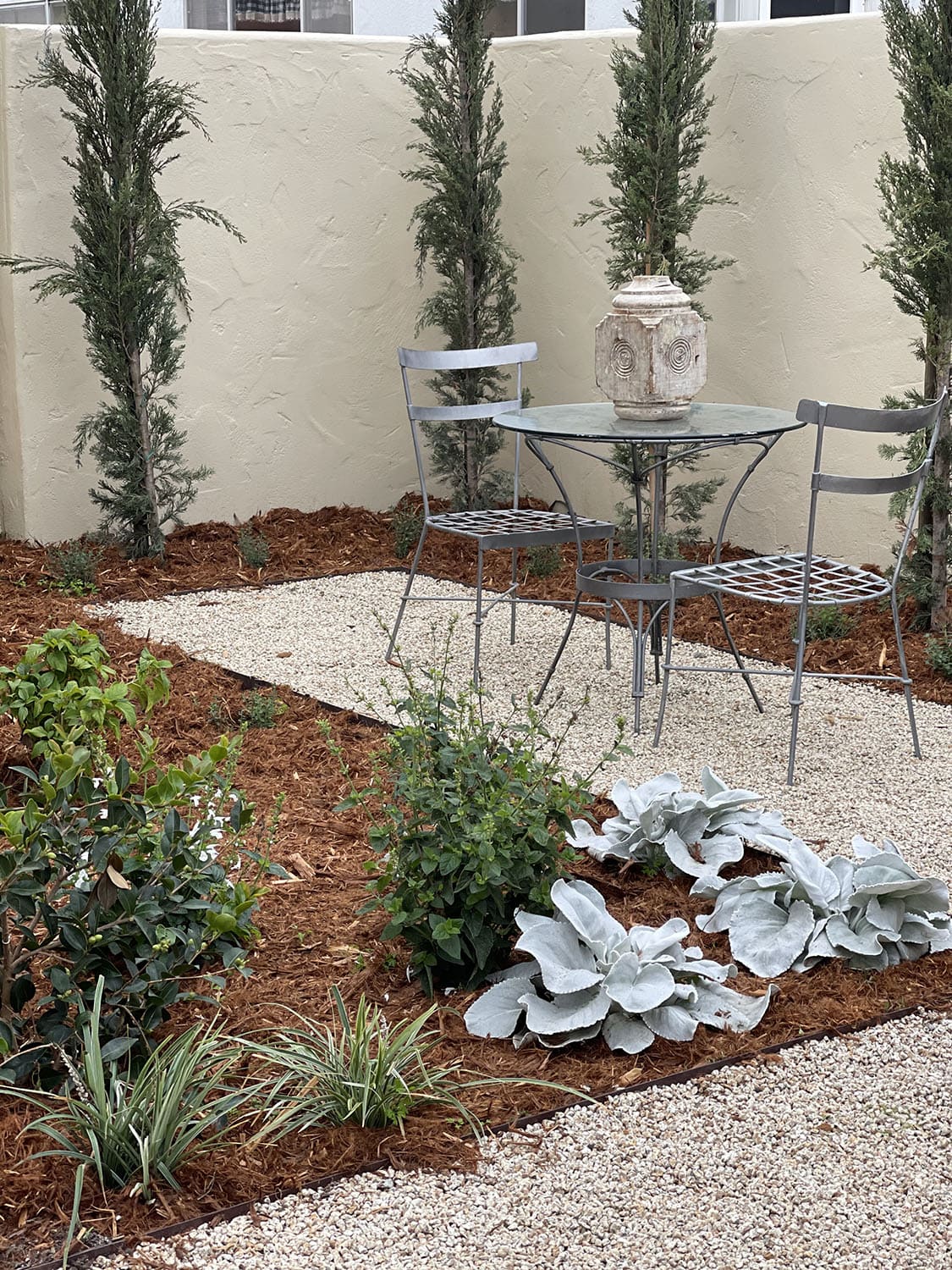 backyard pathway with table and chairs