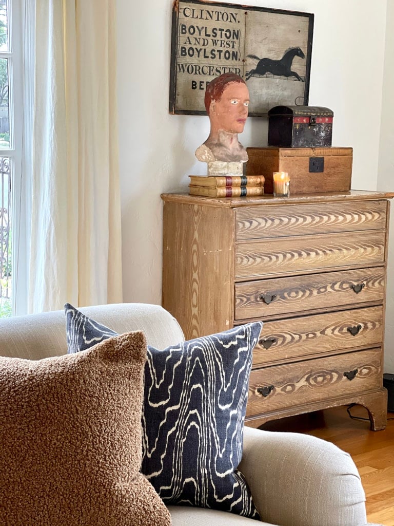 American grained chest vignette and sofa pillows