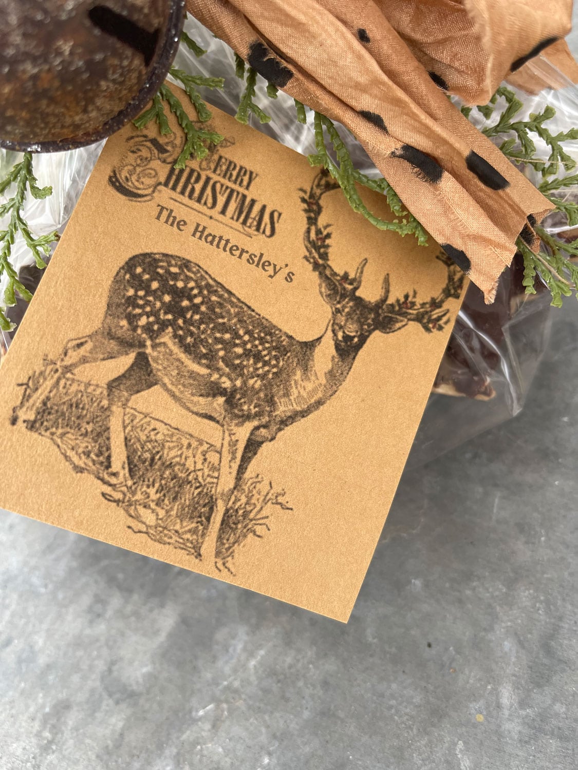 kraft paper gift tags of reindeer created on canva