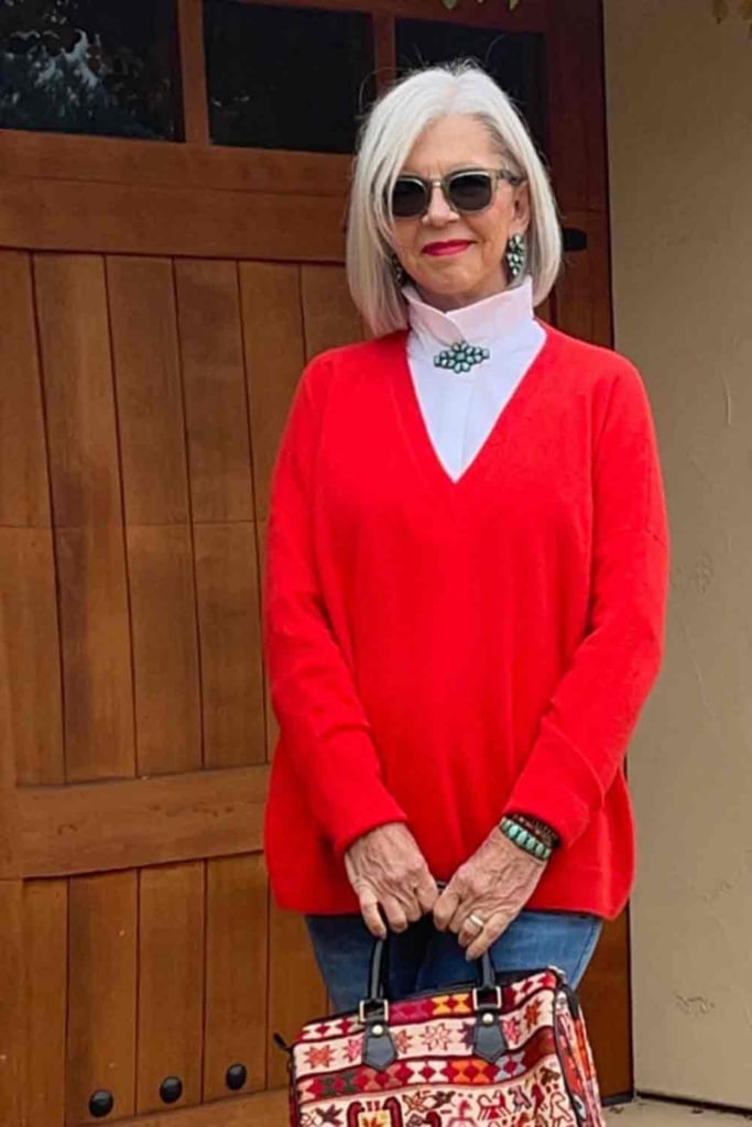 turquoise pin with cashmere sweater and artemis bag