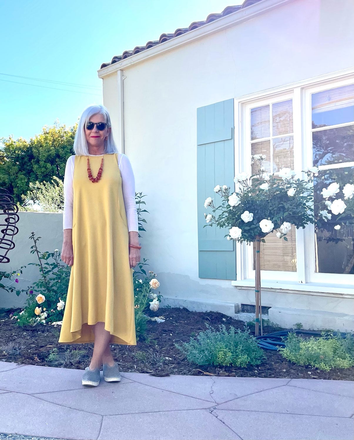cindy hattersley in gold j jill dress and cynthia ashby mesh tee