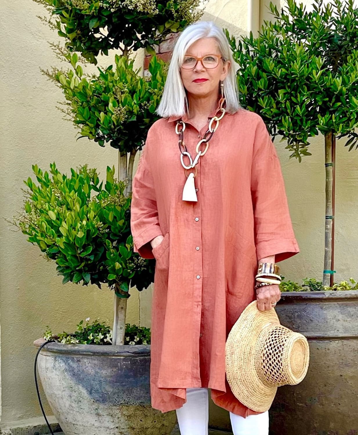 over 50 style blogger cindy hattersley in j jill dress, ibu movement necklace and banana republic hat