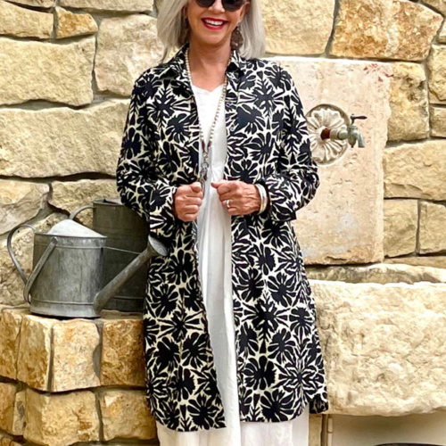 over 50 style blogger cindy hattersley in black and white duster hannoh wessel dress