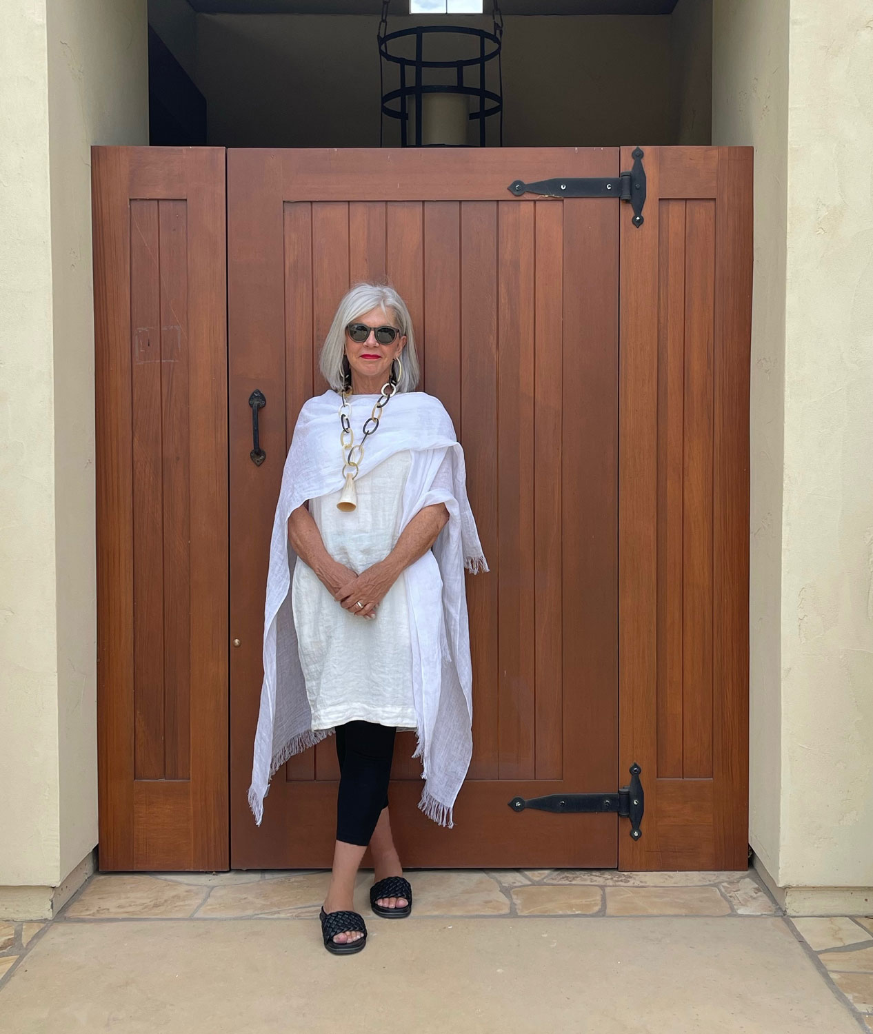 over 50 style blogger cindy hattersley in linen shift & mer sea wrap
