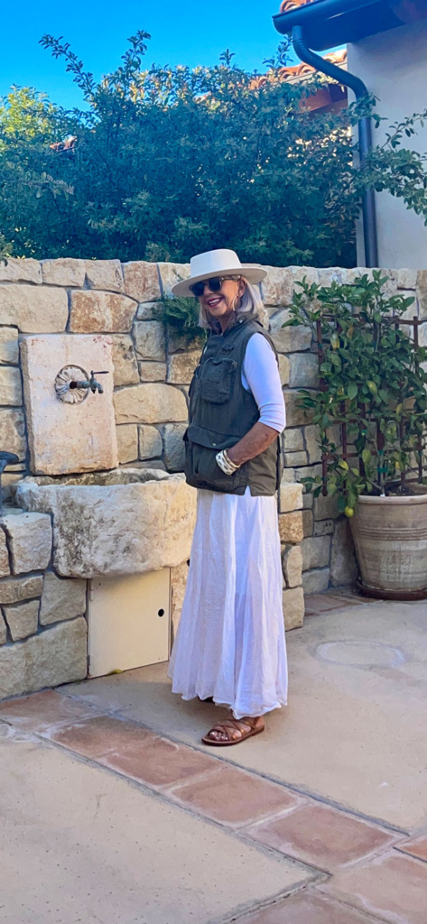 cindy hattersley in banana republic utility vest, gigi pip hat and cp shades skirt