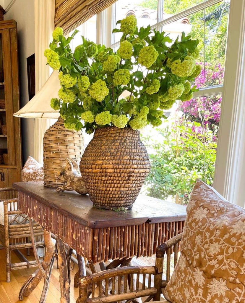 twig table with vintage chairs, vintage wicker lamp and wicker vase filled with snoballs-Summer Decor Secrets: How to Refresh your Home like a Pro