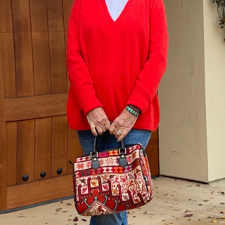 over 50 style blogger cindy hattersley in red cashmere and Artemis Design Co accessories