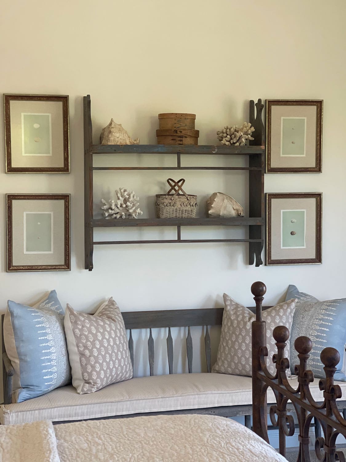 cindy hattrsley's bedroom bench with vintage prints