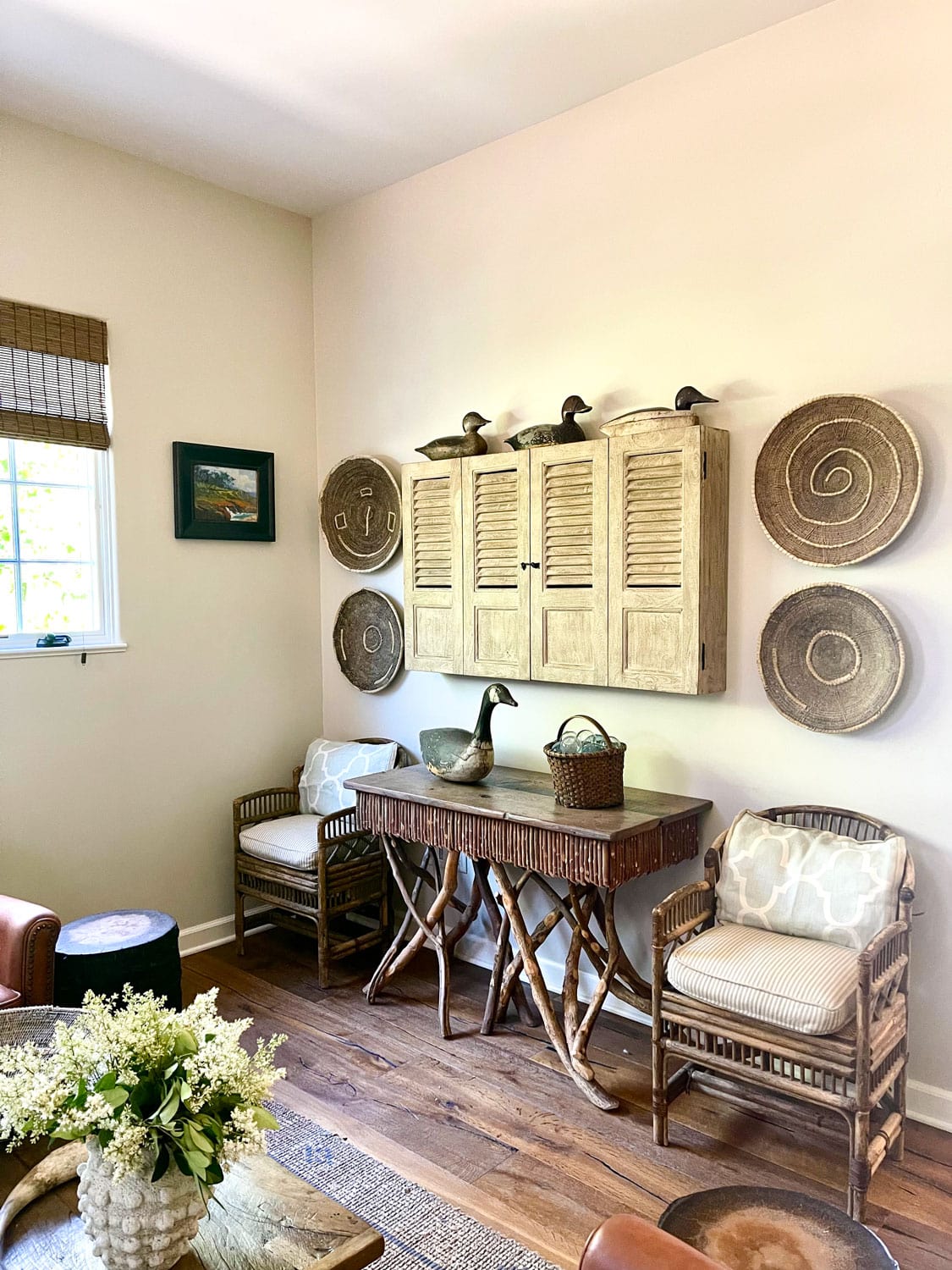 media cabinet with baskets and decoys