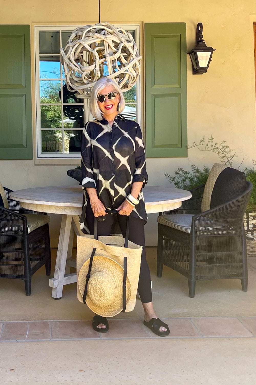 cindy hattersley in black leggings italian tunic shirt and Janessa leone bag