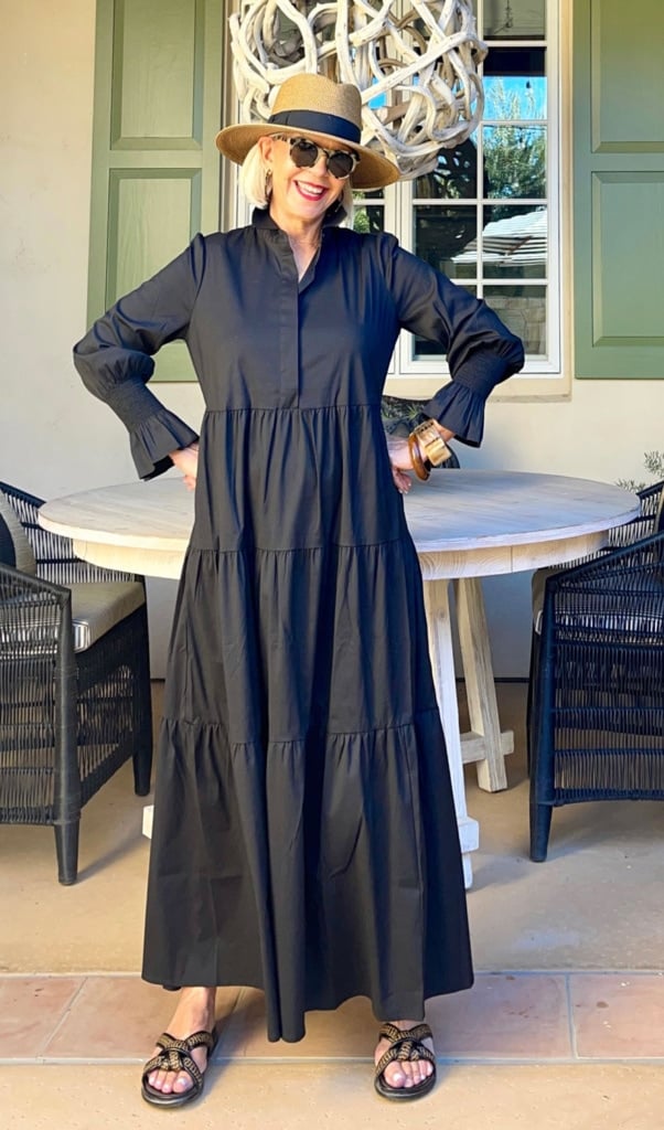 black maxi dress with sandals and straw hat