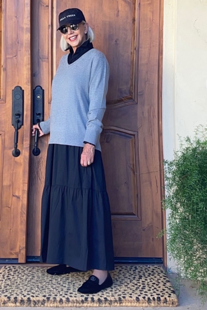 Quince cashmere sweater and black tiered dress