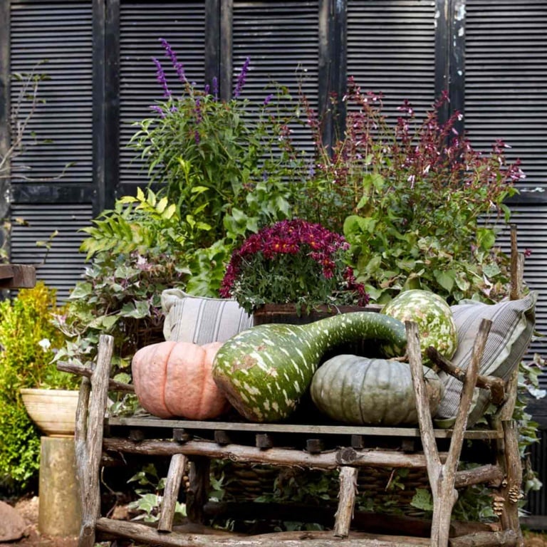 natural fall decor with pumpkins and florals