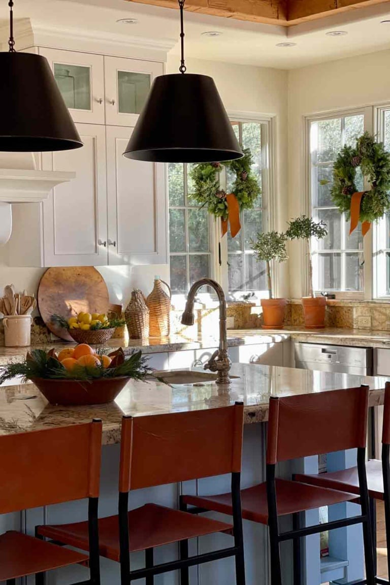 kitchen island decorated for christmas with oranges