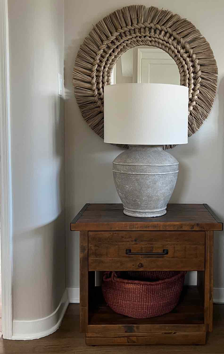 Nightstand with lamp and mirror