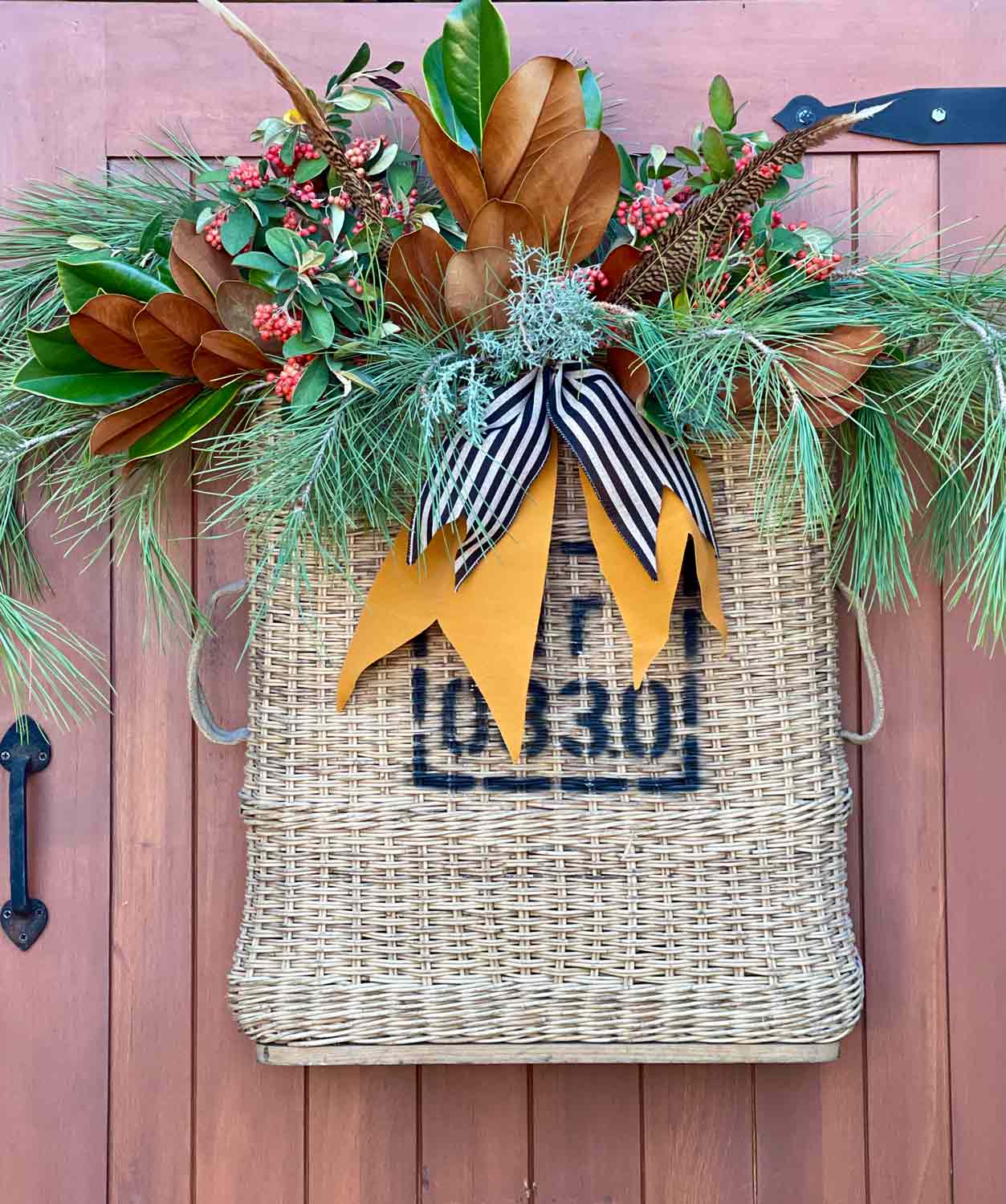Artillary basket filled with Christmas greens