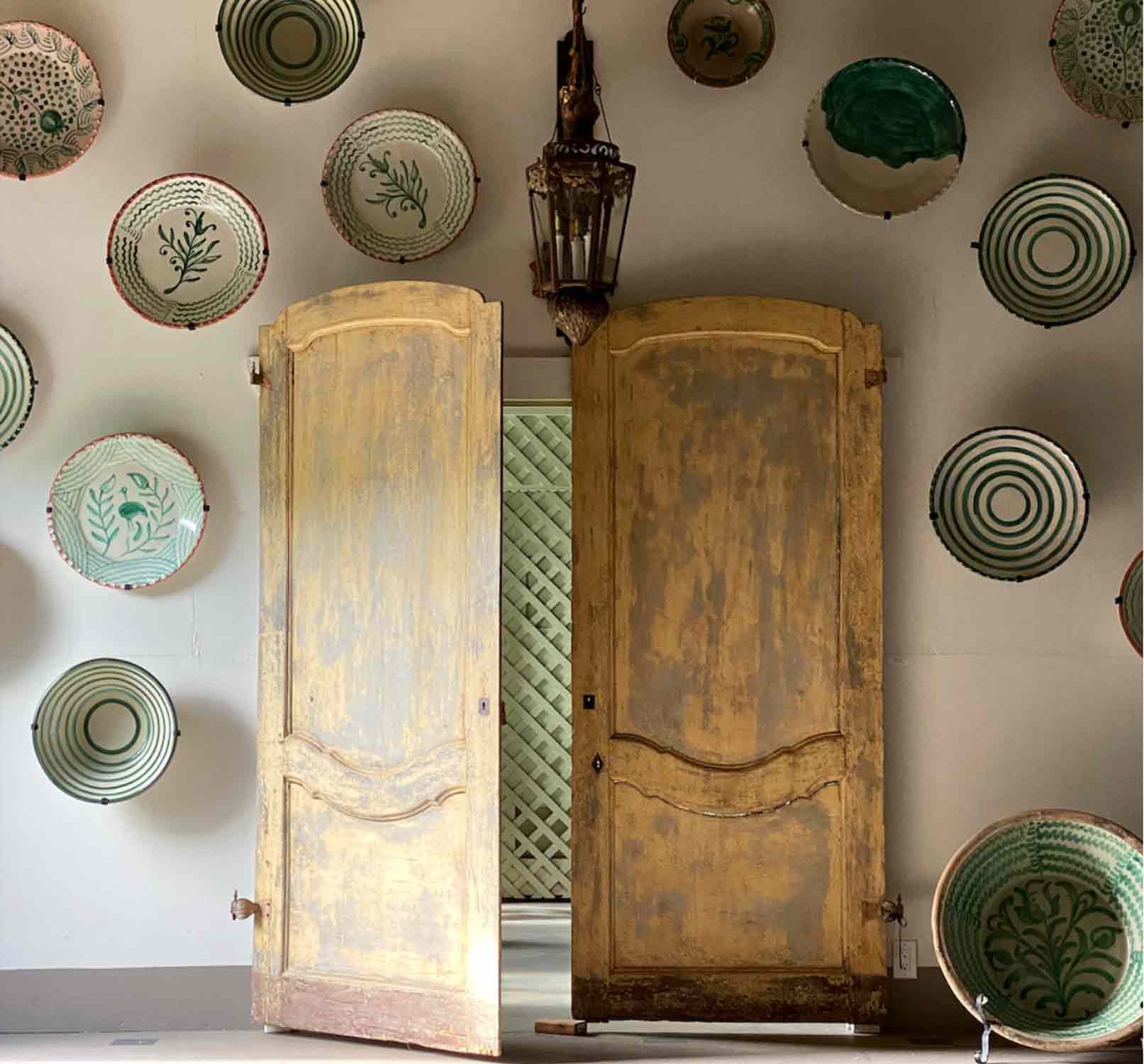 Casa Gusto Palm Beach antique doors and pottery