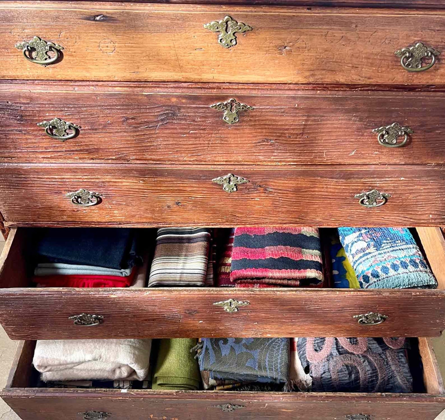 Antique Chest with drawers filled with scarves