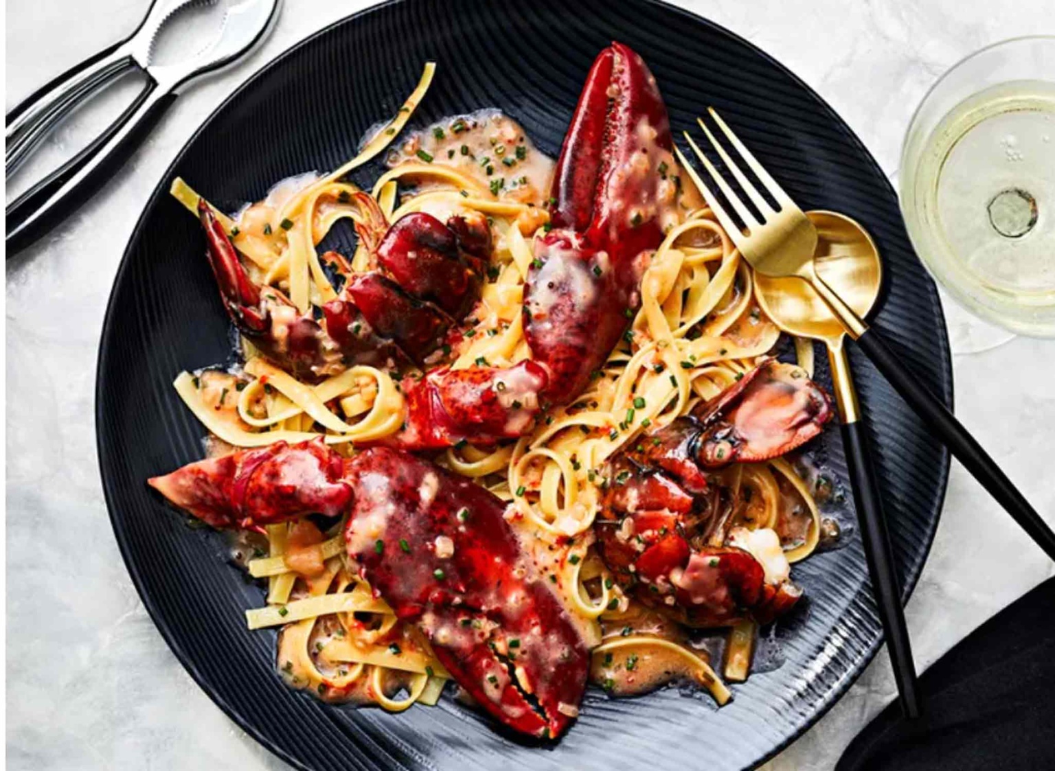 food and wine lobster pasta dish