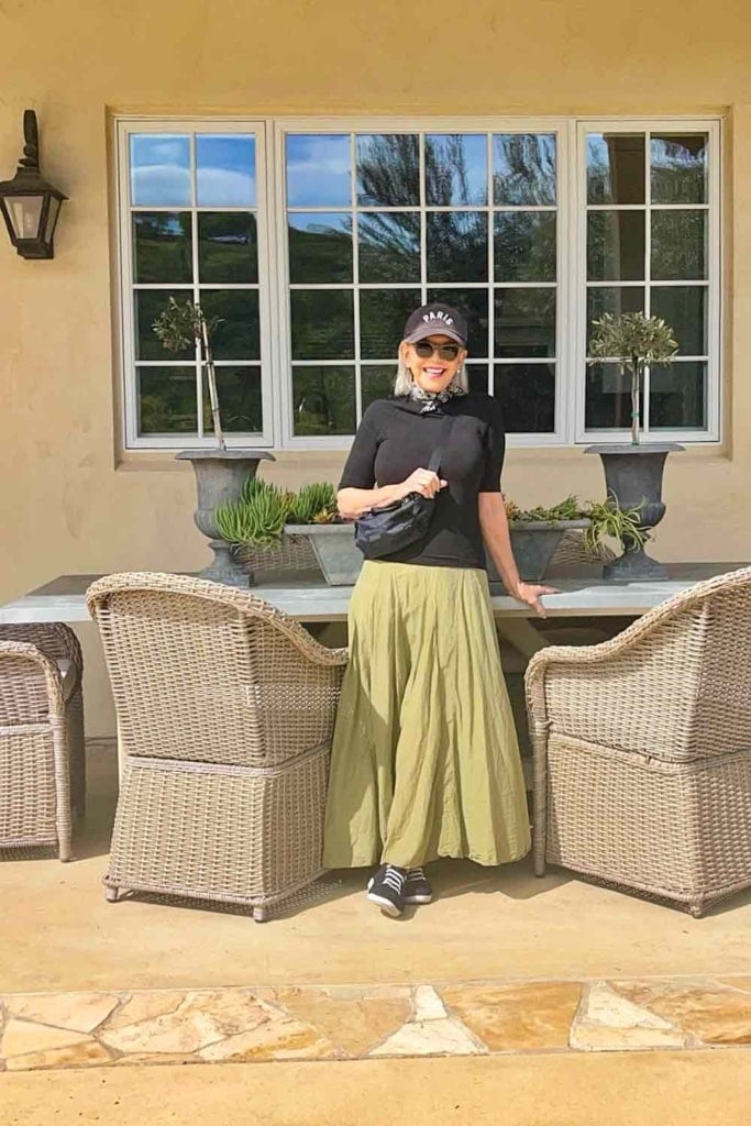 CP shades lily skirt with vionic sneaks and paris hat