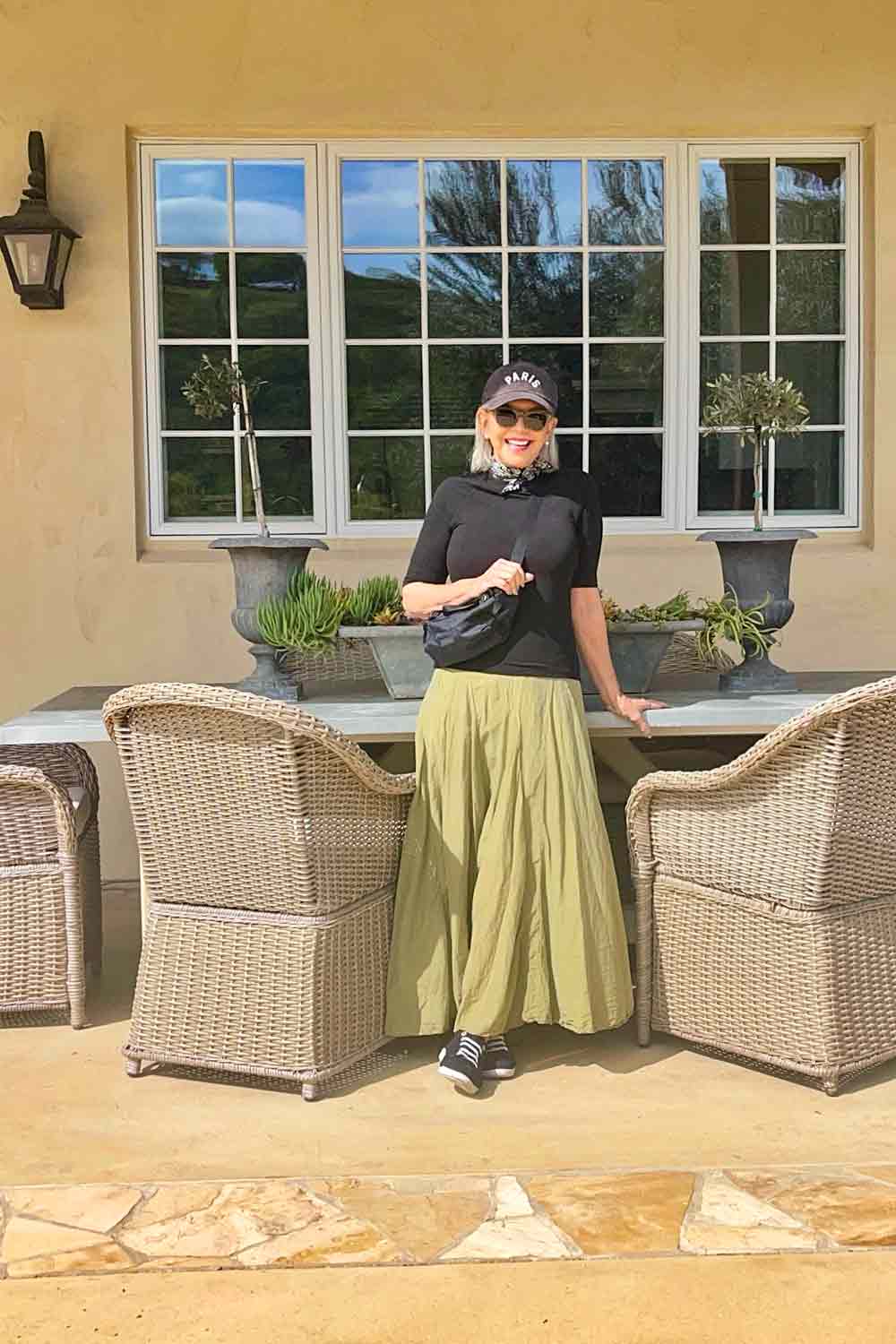 CP shades lily skirt with vionic sneaks and paris hat