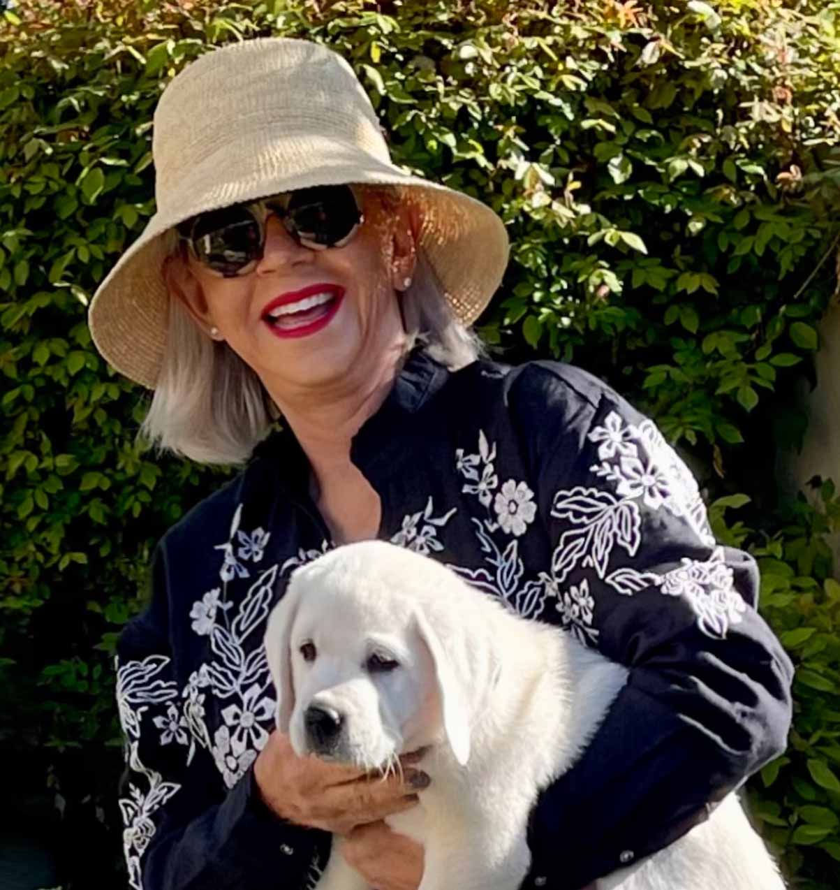 Influencer Cindy Hattersley and her yellow lab pup Scout