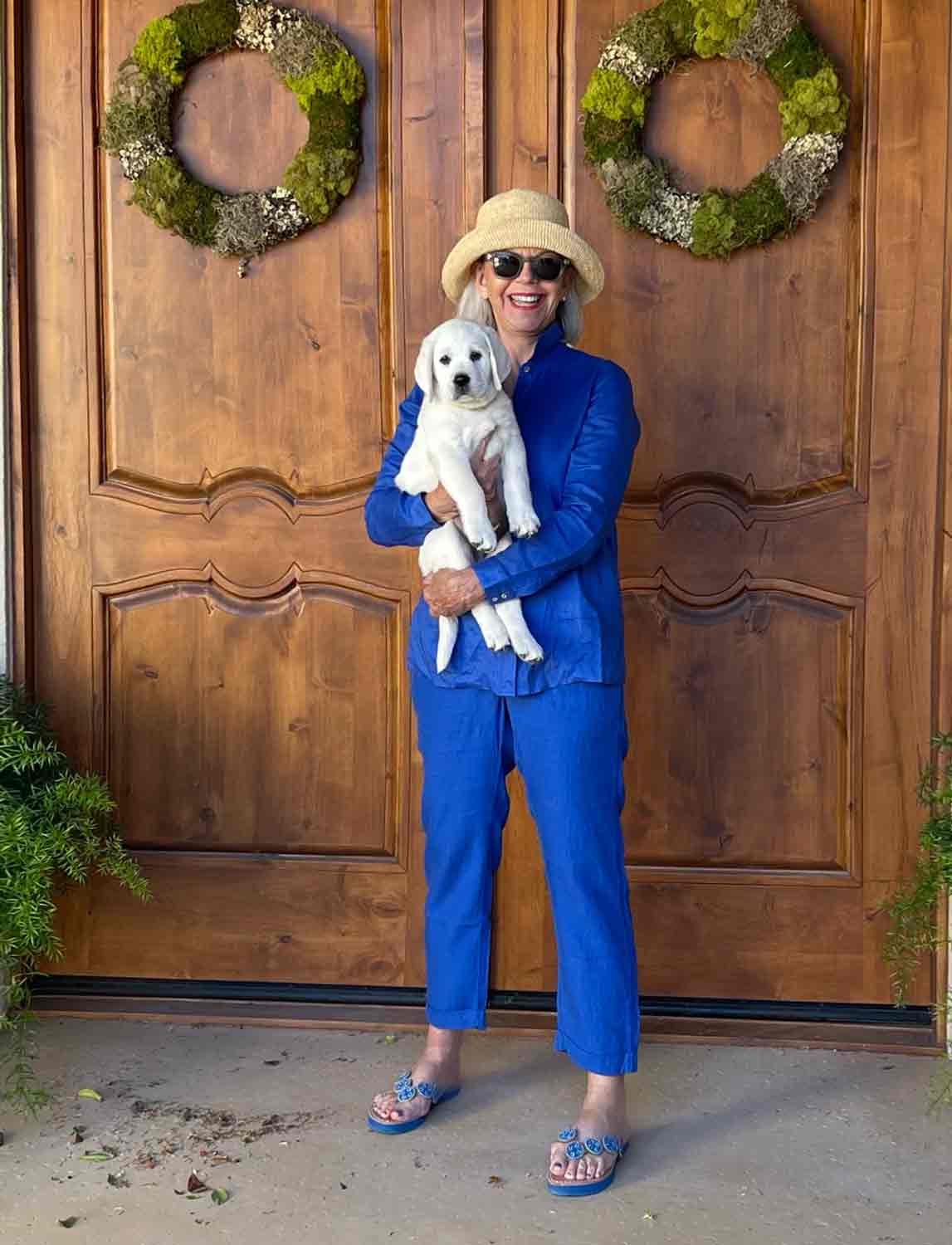 matching outfit women over 50 J Jill Blue Linen Outfit on Cindy Hattersley with her lab puppy