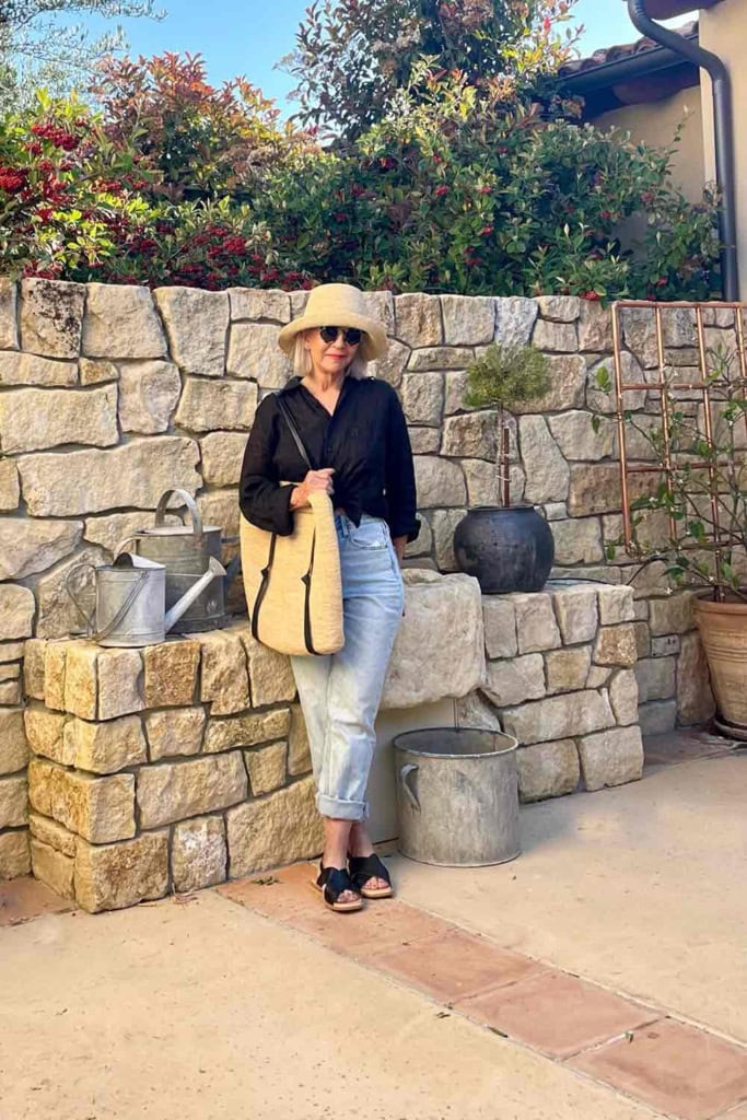 black linen shirt with H&M jeans and janessa leone straw accessories