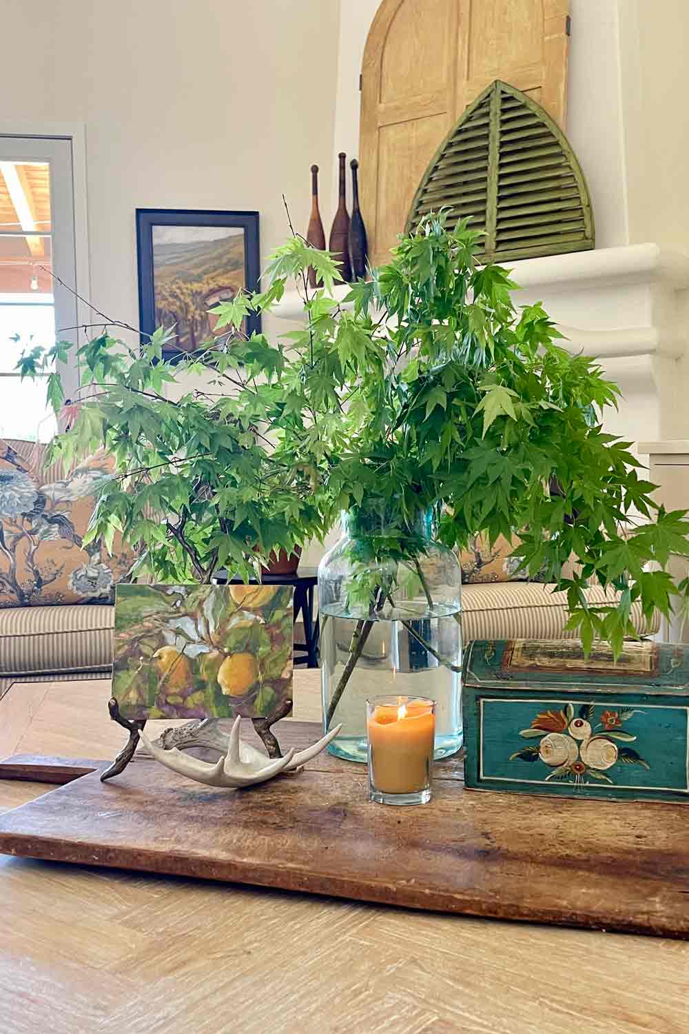 coffee table arrangement-leaves vintage box candle
