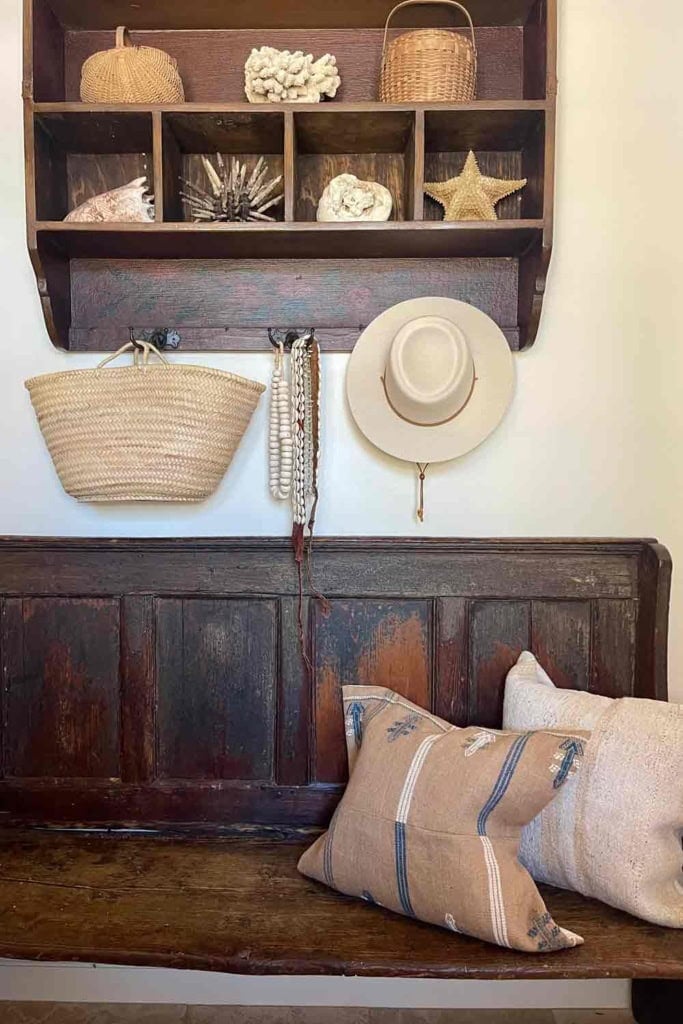 Antique bech with hanging cupboard and summer accessories