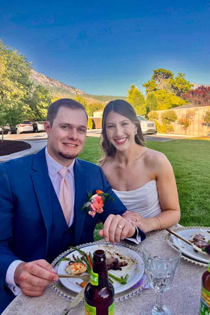bride and groom at dinner