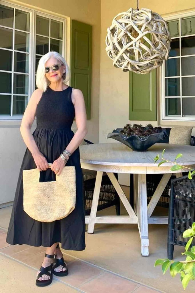 woman with gray hair in black sleeveless dress-cindy hattersley