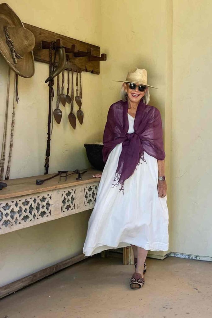 White Sleeveless Dress with Purple Shawl, hat and kilim mules