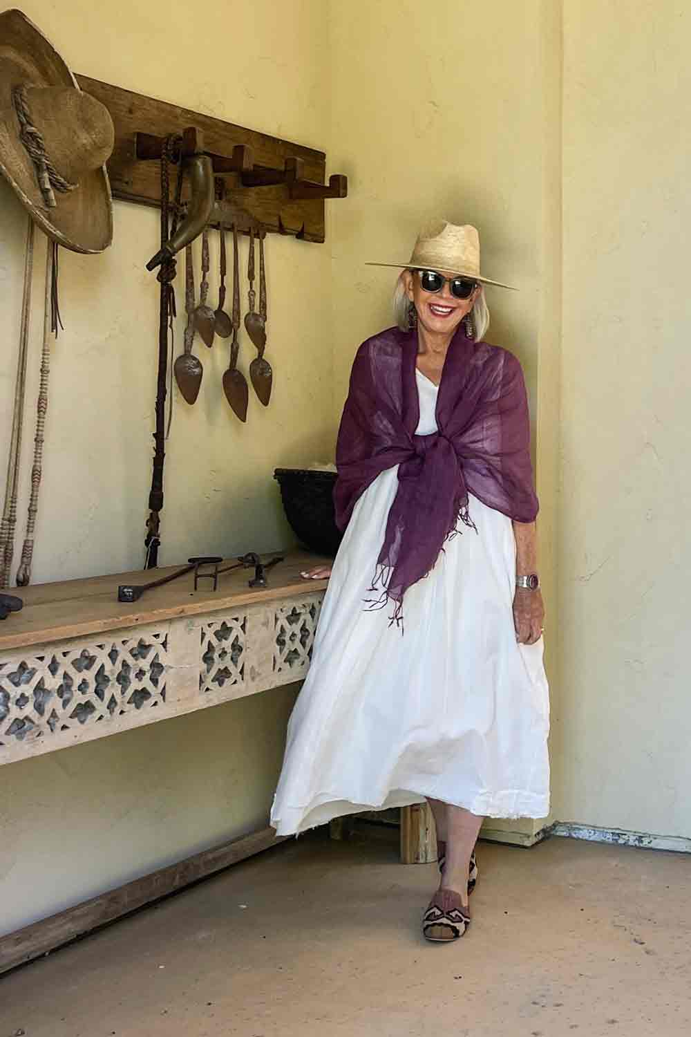White Sleeveless Dress with Purple Shawl, hat and kilim mules