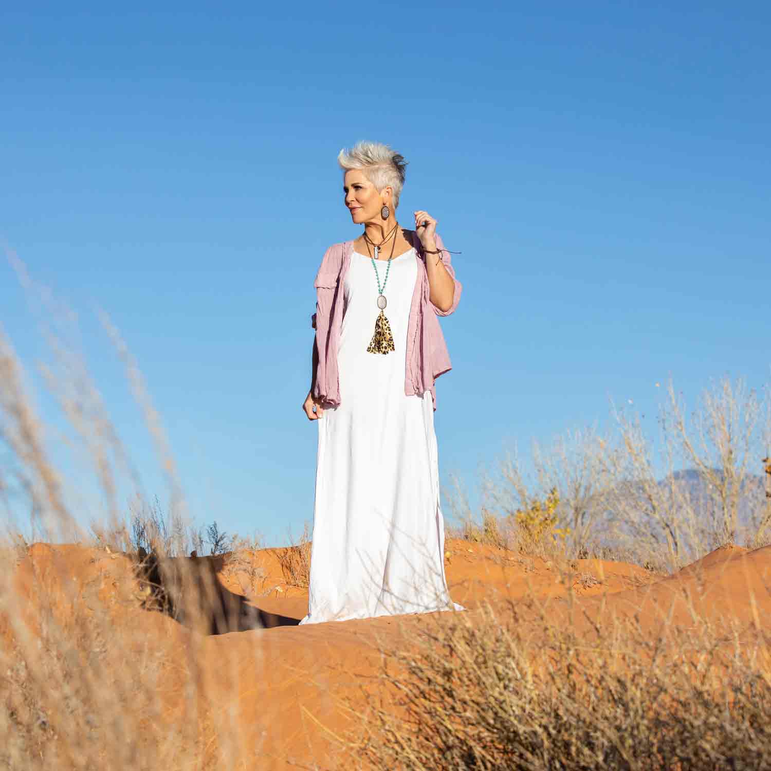 Shauna Grow chic over 50 in long white dress