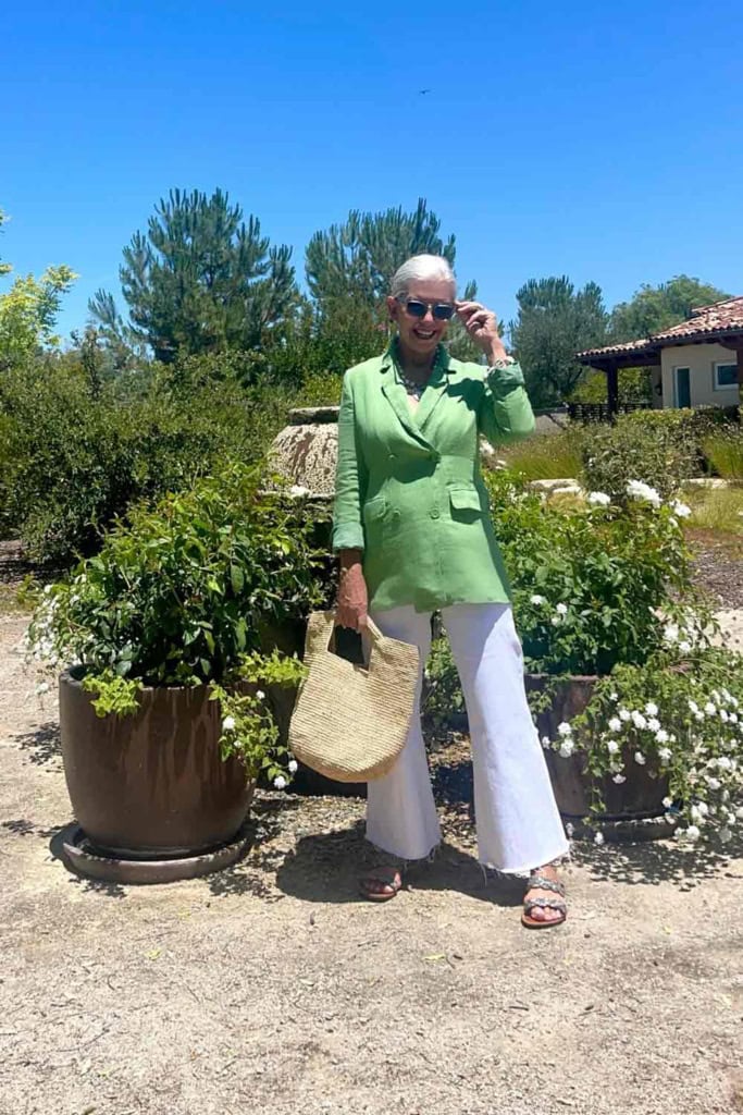 cindy hattersley in green linen jacket and white jeans