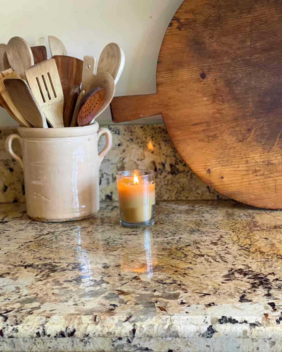 vintage breadboard and italian pot on counter